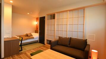 Deluxe Double Room with Balcony | Down comforters, desk, laptop workspace, blackout drapes