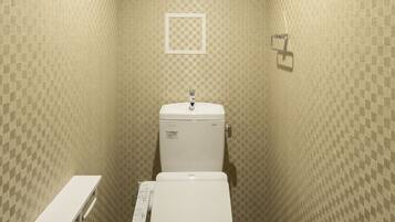 Un baño pequeño y funcional con inodoro, lavabo y espejo.