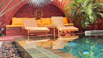 Outdoor pool, open 8:00 AM to 9:30 PM, sun loungers