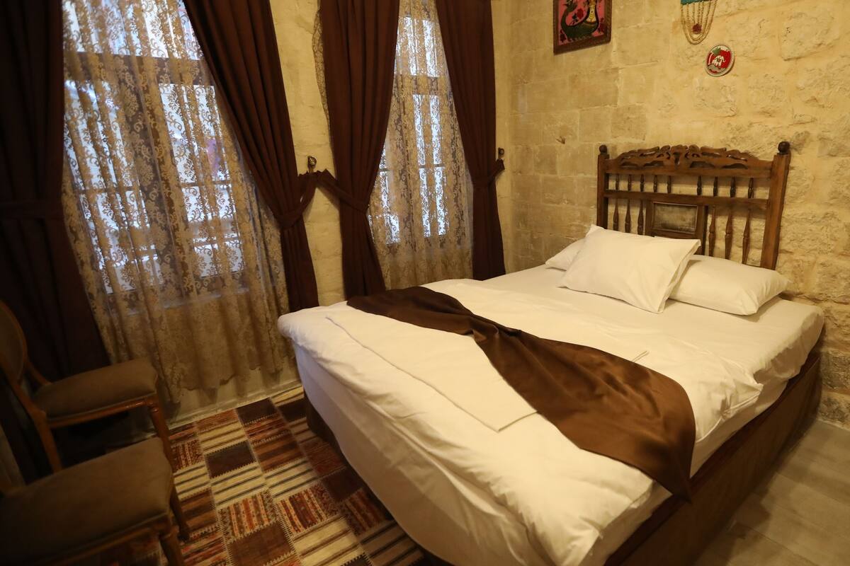 Quarto casal ou duplo | Frigobar, Wi-Fi de cortesia, roupa de cama