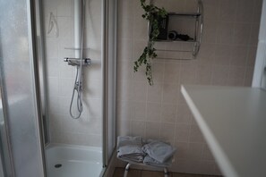 Bathtub, hair dryer, towels, soap
