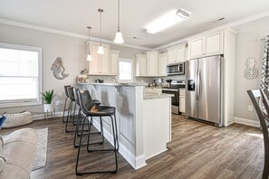 Fridge, microwave, oven, stovetop - Completely renovated 3 bedroom, 2.5 bath house across the street from ocean (Garden City Beach)