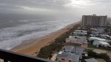 On the beach, sun-loungers, beach towels