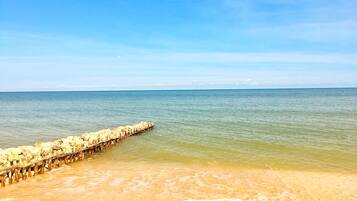 On the beach, beach towels