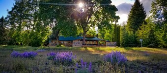 HISTORIC RUSHING WATER LODGE on the rogue river was built in 1910