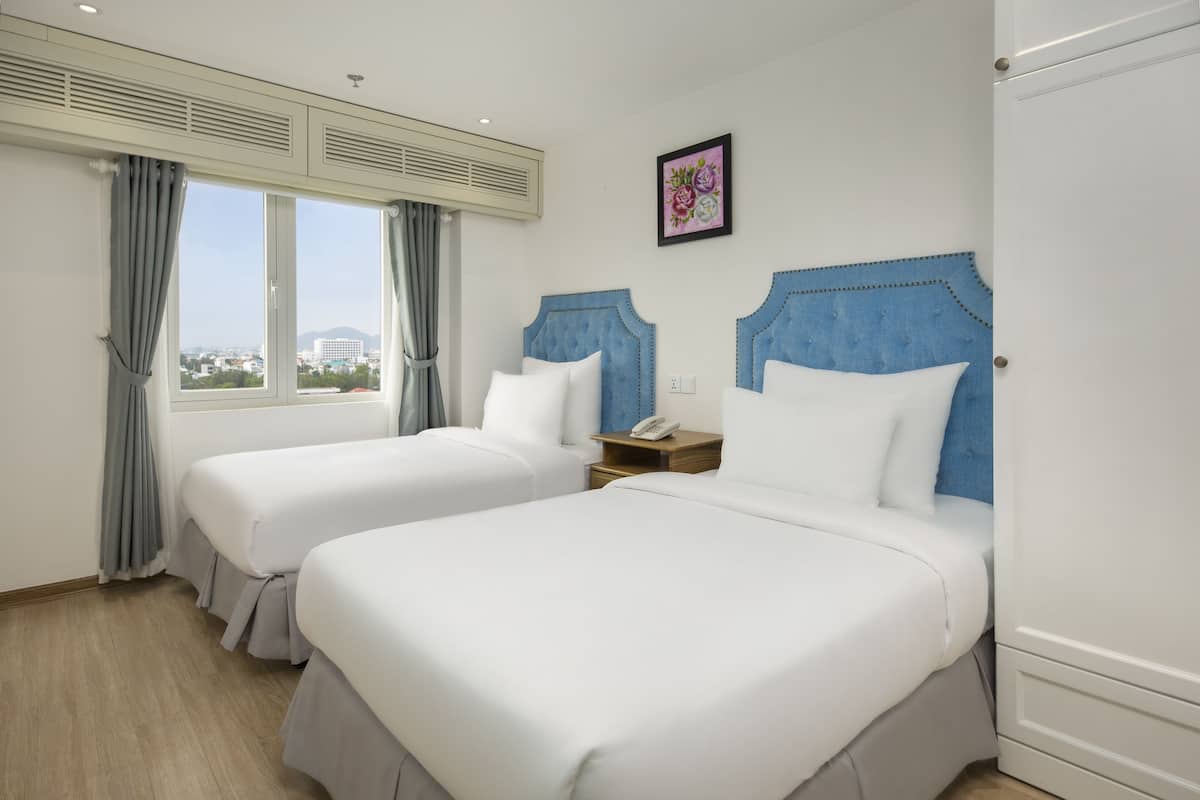 Executive Apartment, 2 Bedrooms, City View | In-room safe, desk, blackout drapes, soundproofing