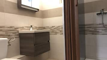 Shower, rainfall showerhead, towels