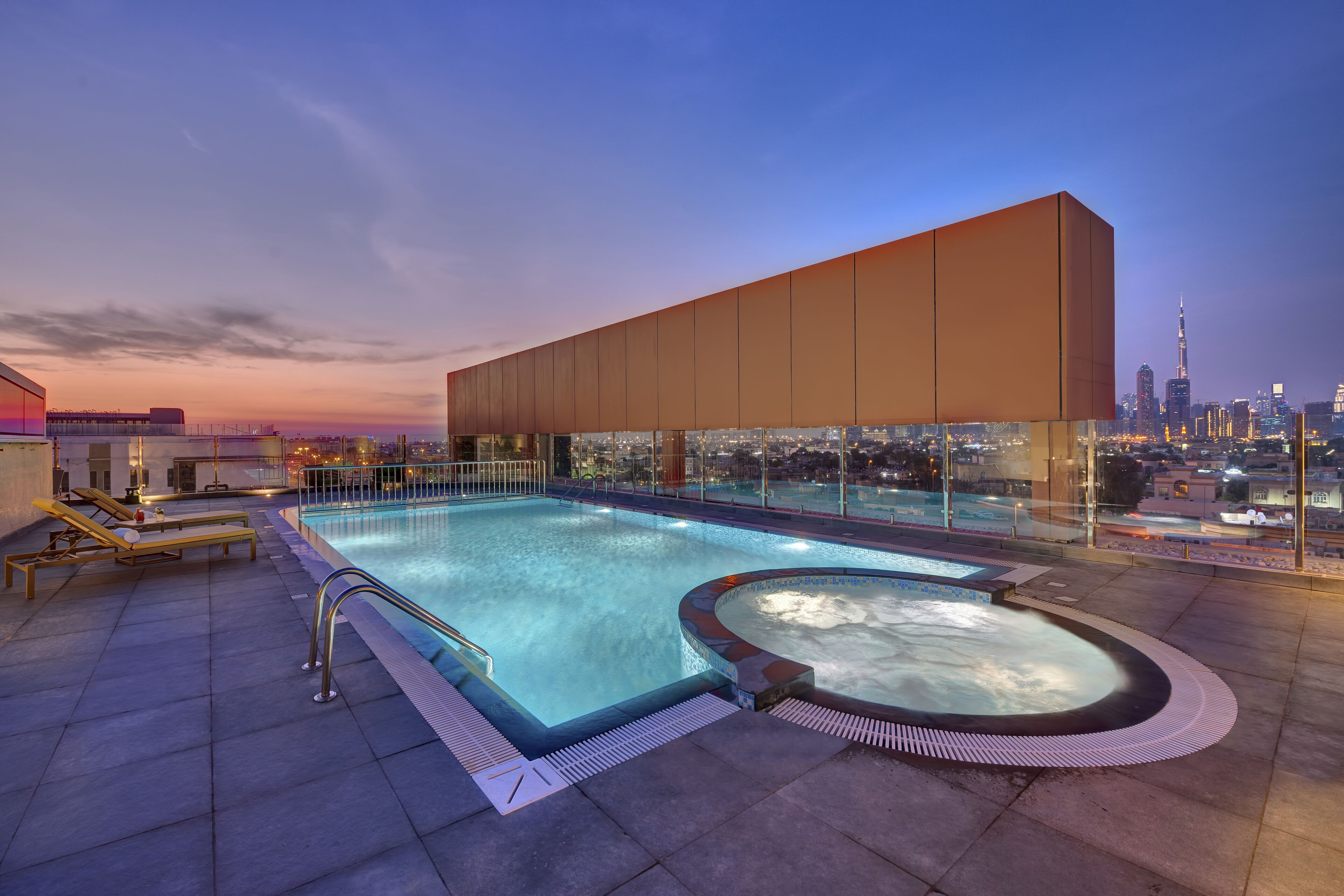 outdoor pool, open 8:00 am to 8:00 pm, pool umbrellas, pool loungers