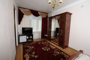 Luxury Room, City View | Desk, laptop workspace, blackout drapes, iron/ironing board