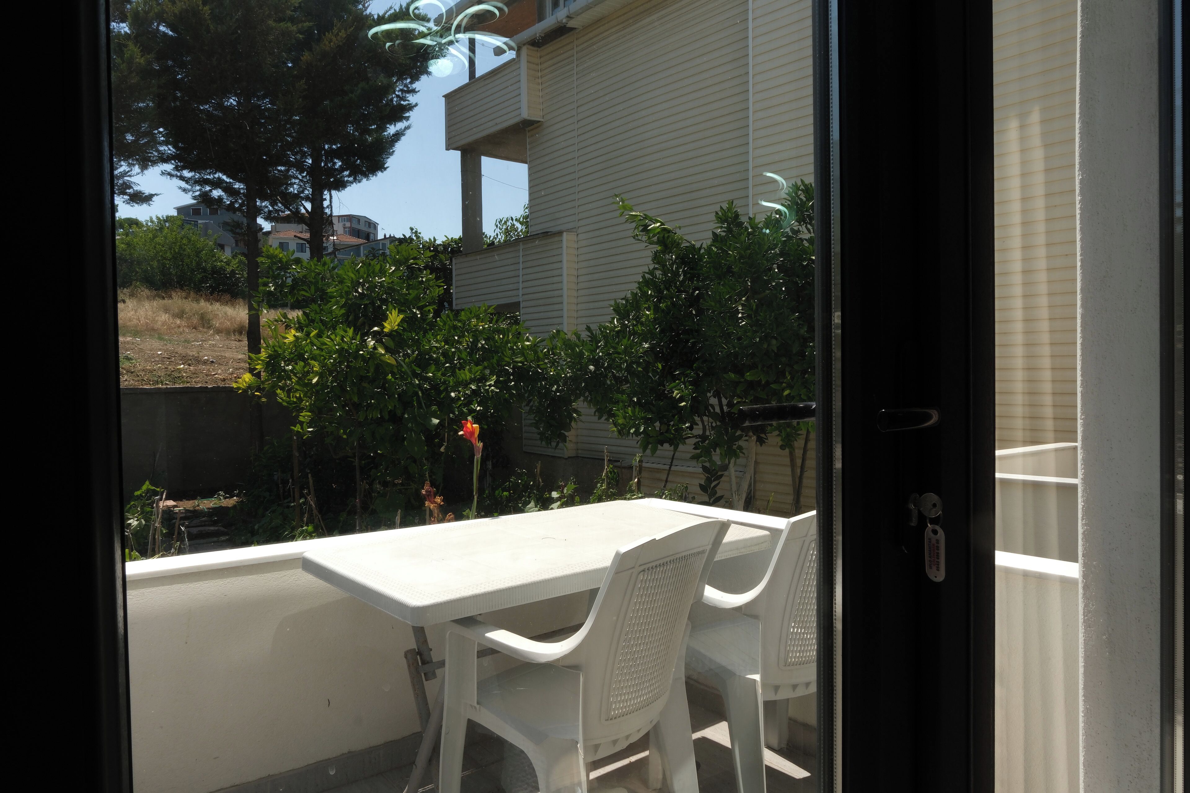 Habitación Deluxe, terraza, vistas al jardín | Balcón