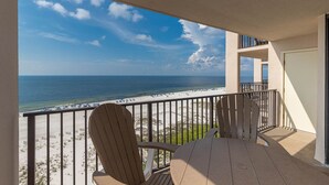 A balcony with a view of the beach and ocean. - 1BR 1BA ~ Phoenix East ~ See why our guests chose the 10th floor! (Orange Beach)
