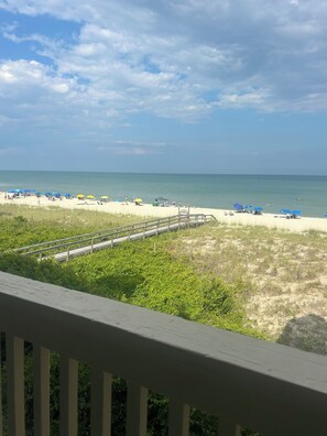 On the beach, sun loungers, beach towels