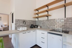 Fridge, microwave, coffee/tea maker, toaster