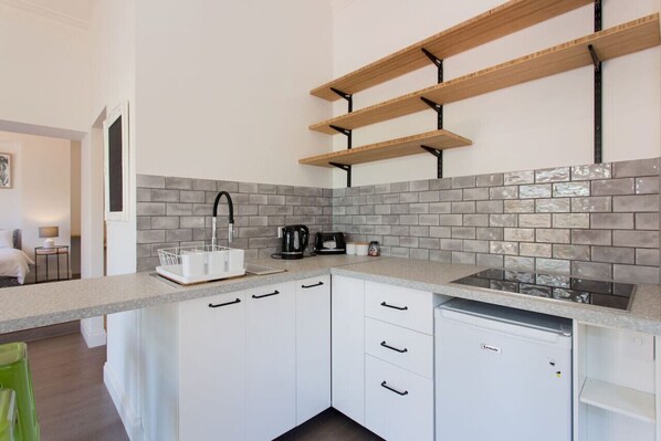 Fridge, microwave, coffee/tea maker, toaster