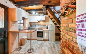 Kjøleskap, kokeplater og kaffetrakter/tekoker