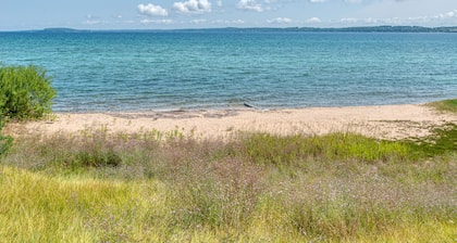 100 ft of private sandy beach on West Bay 3 miles from downtown TC.  Lic#2022-53