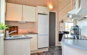 Frigorifero, piano cottura, lavastoviglie, macchina per tè/caffè