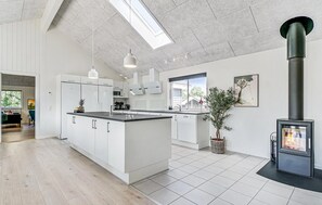 Fridge, stovetop, dishwasher, coffee/tea maker