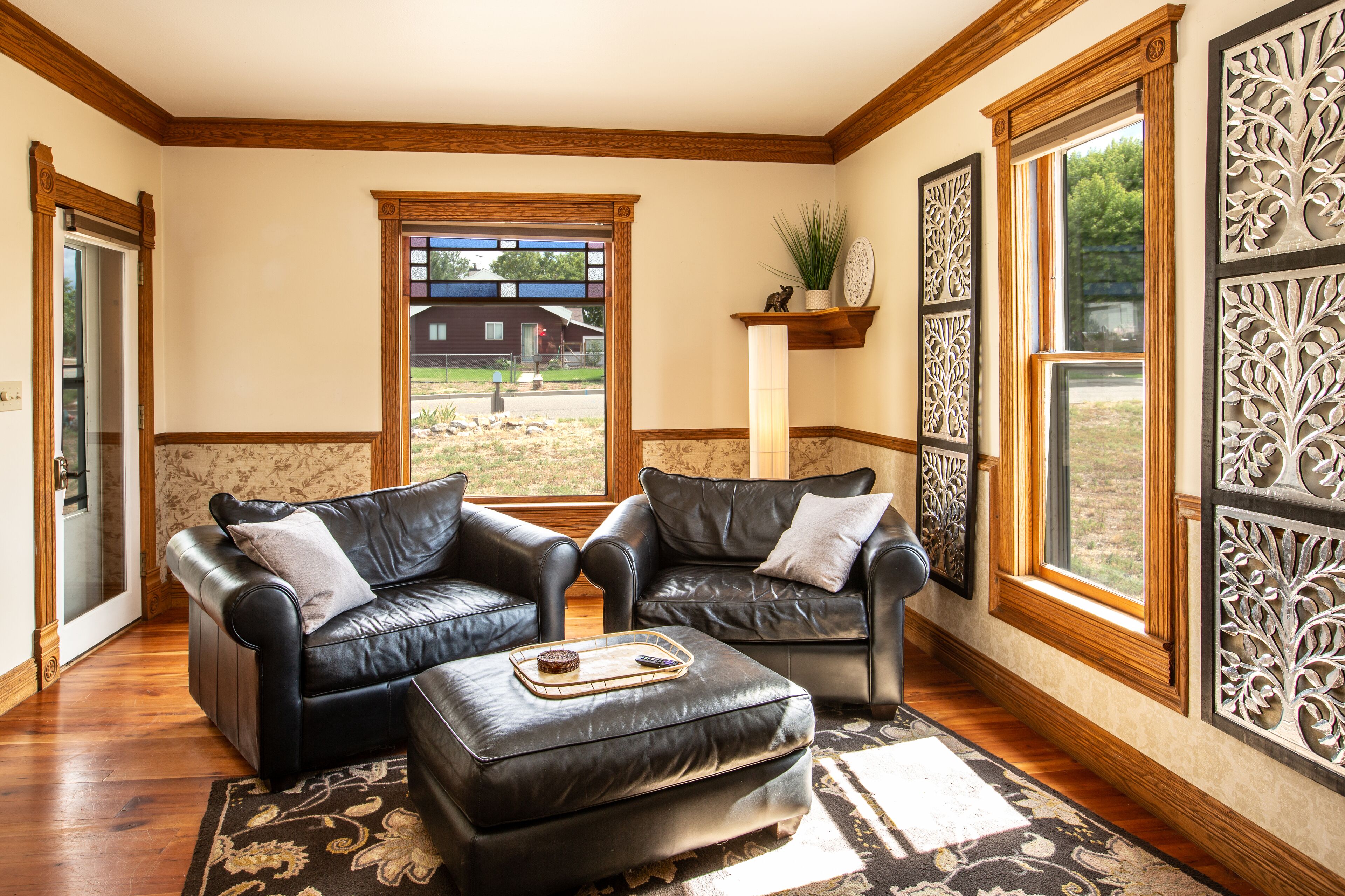 Another view of the bright living room. There are curtains for privacy as well.