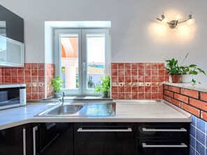 Micro-ondas, fogão, lava-louças, freezer