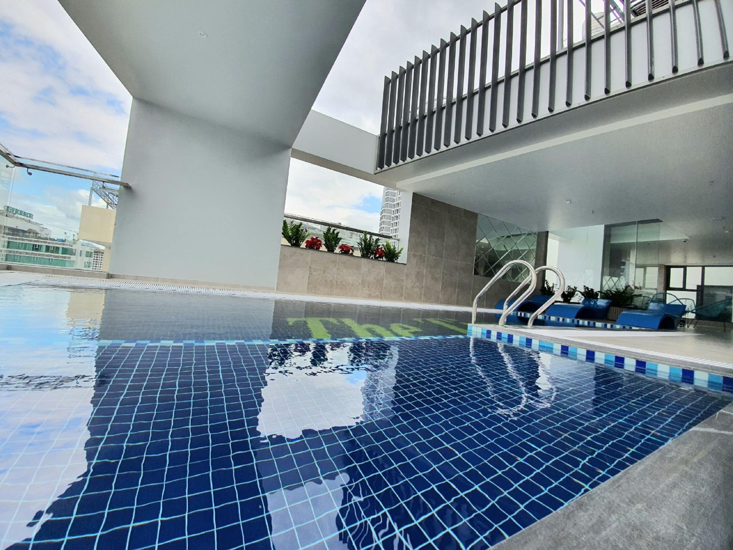 Indoor pool, open 6:00 AM to 10:00 PM, pool loungers