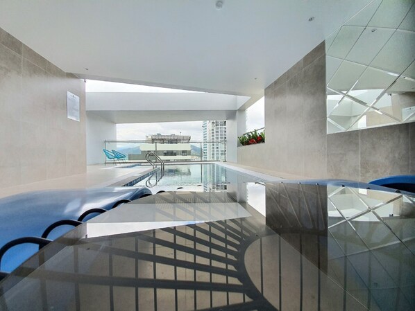 Indoor pool, open 6:00 AM to 10:00 PM, sun loungers