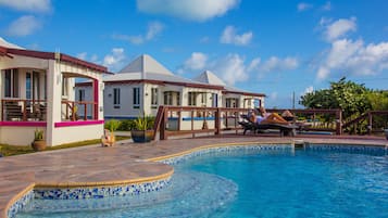 Outdoor pool, pool umbrellas, pool loungers