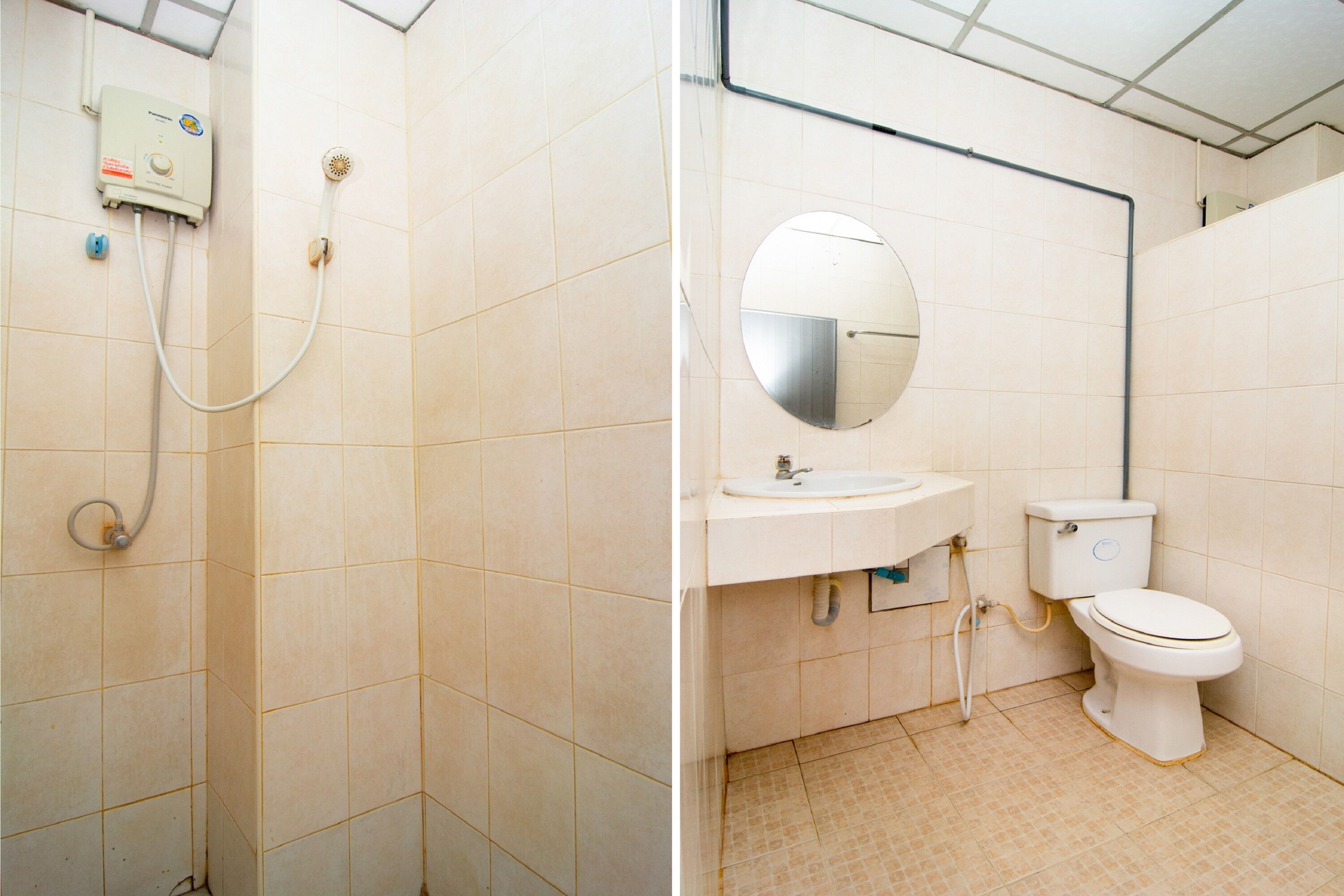 A bathroom with a shower, sink, and toilet.