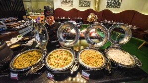 A buffet with various dishes, including pasta, salad, and rice. - Maria Eloisa Royal House (Daanbantayan)