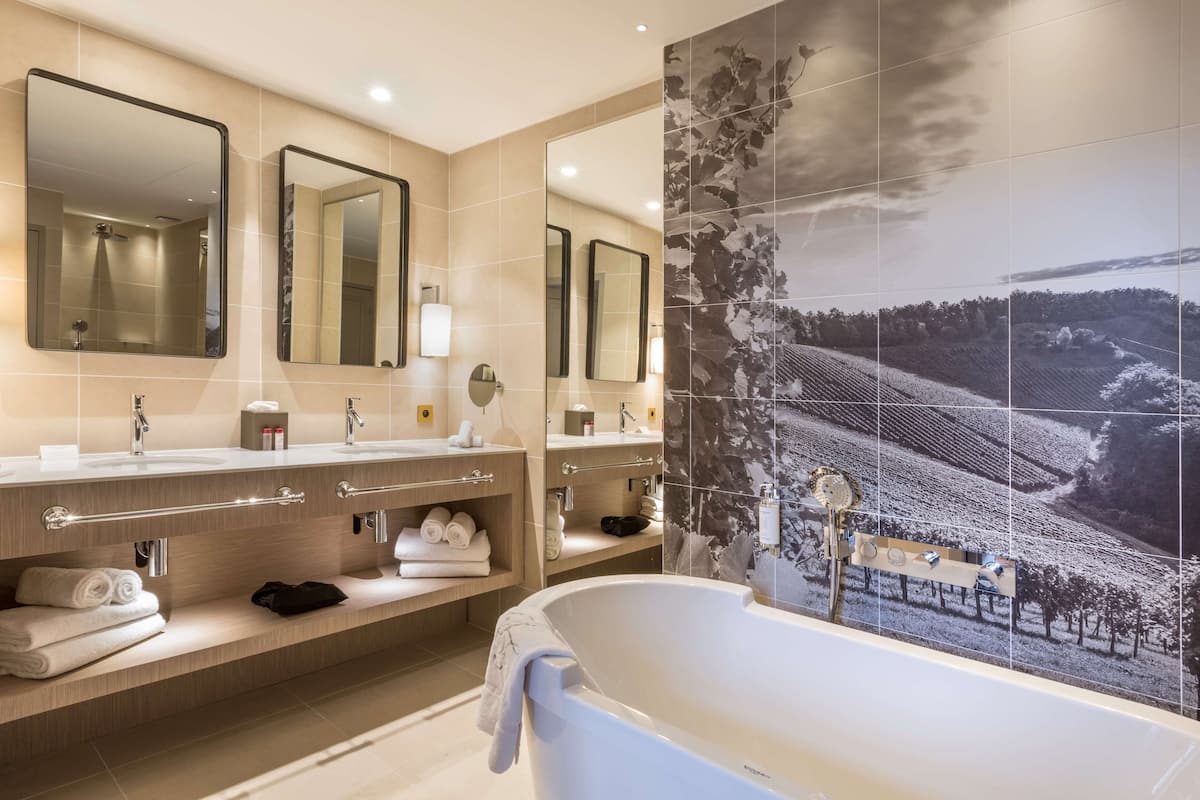 suite, 1 king bed, non smoking, terrace (twin bed on request;with sofabed) | bathroom | shower, hair dryer, bathrobes, slippers