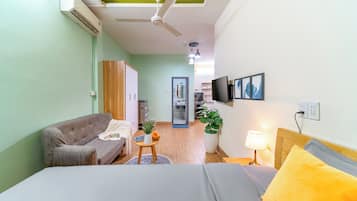 Premium bedding, pillow-top beds, desk, laptop workspace