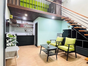 City Studio | Living area | 32-inch flat-screen TV with cable channels, TV