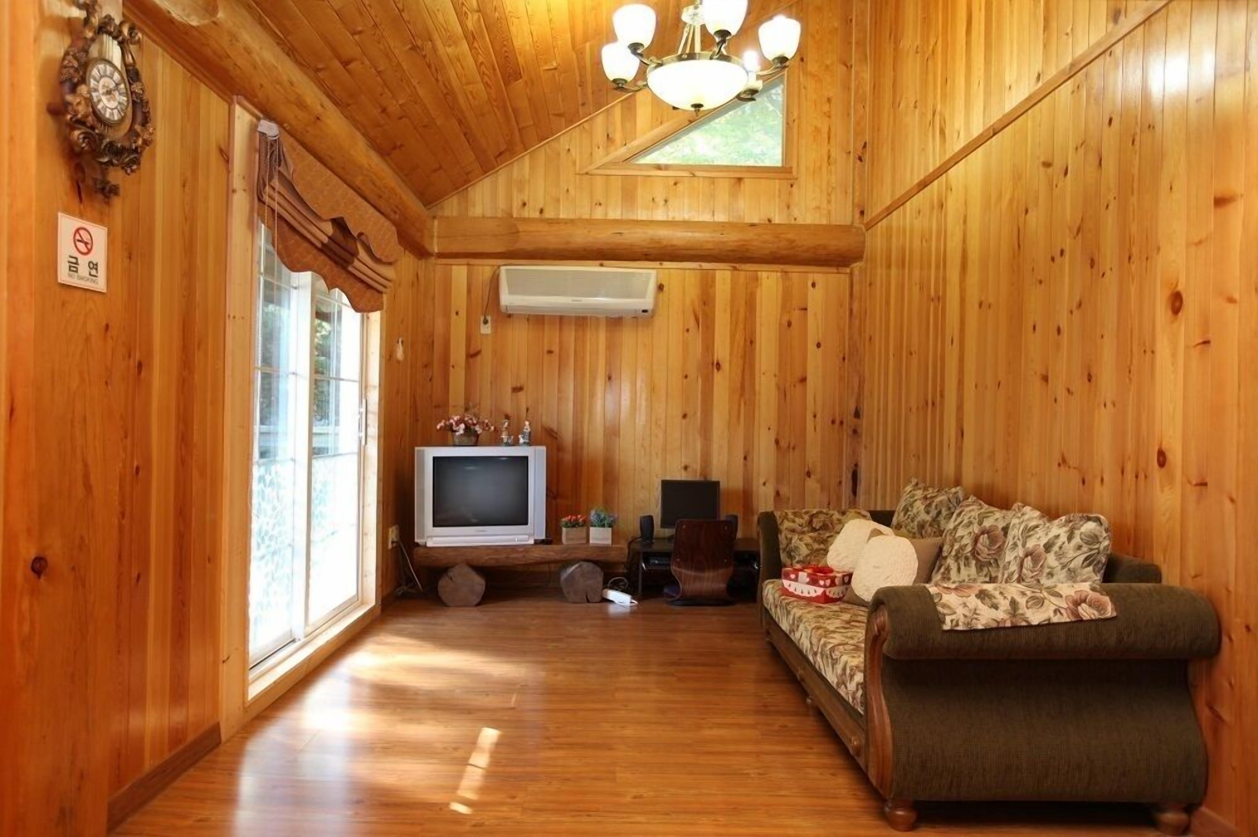 Family Room | Living area | 55-inch LCD TV with satellite channels, TV, heated floors