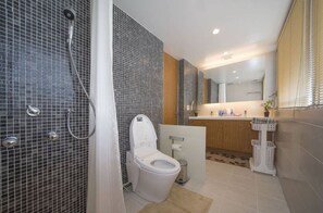 A modern bathroom with a shower, toilet, and sink. - K Seaveiw 250㎡ ONNA 2 big suites, 3 full bath 3F (Nakadomari, Onna, Kunigami-gun)