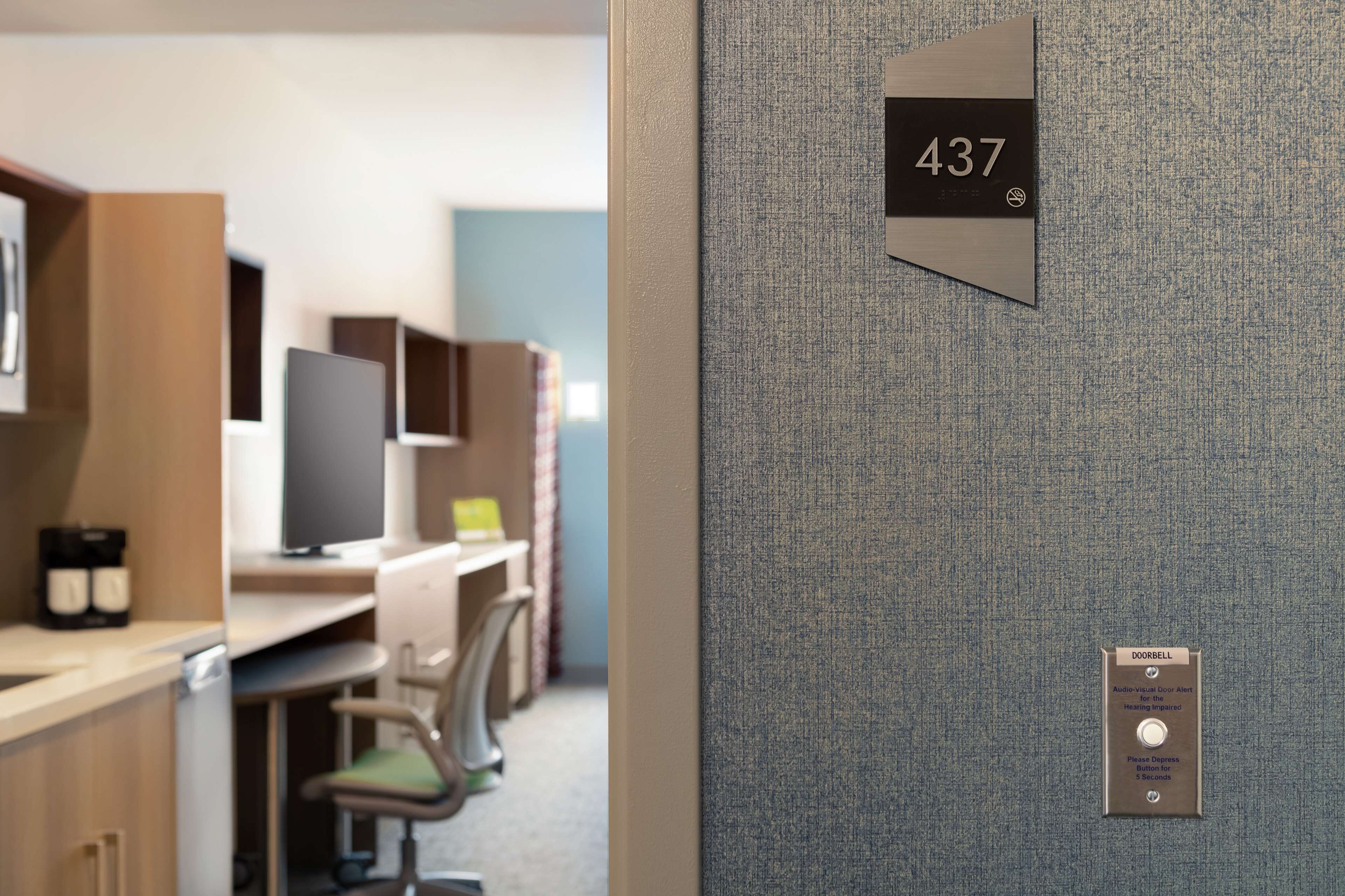desk, laptop workspace, blackout curtains, iron/ironing board