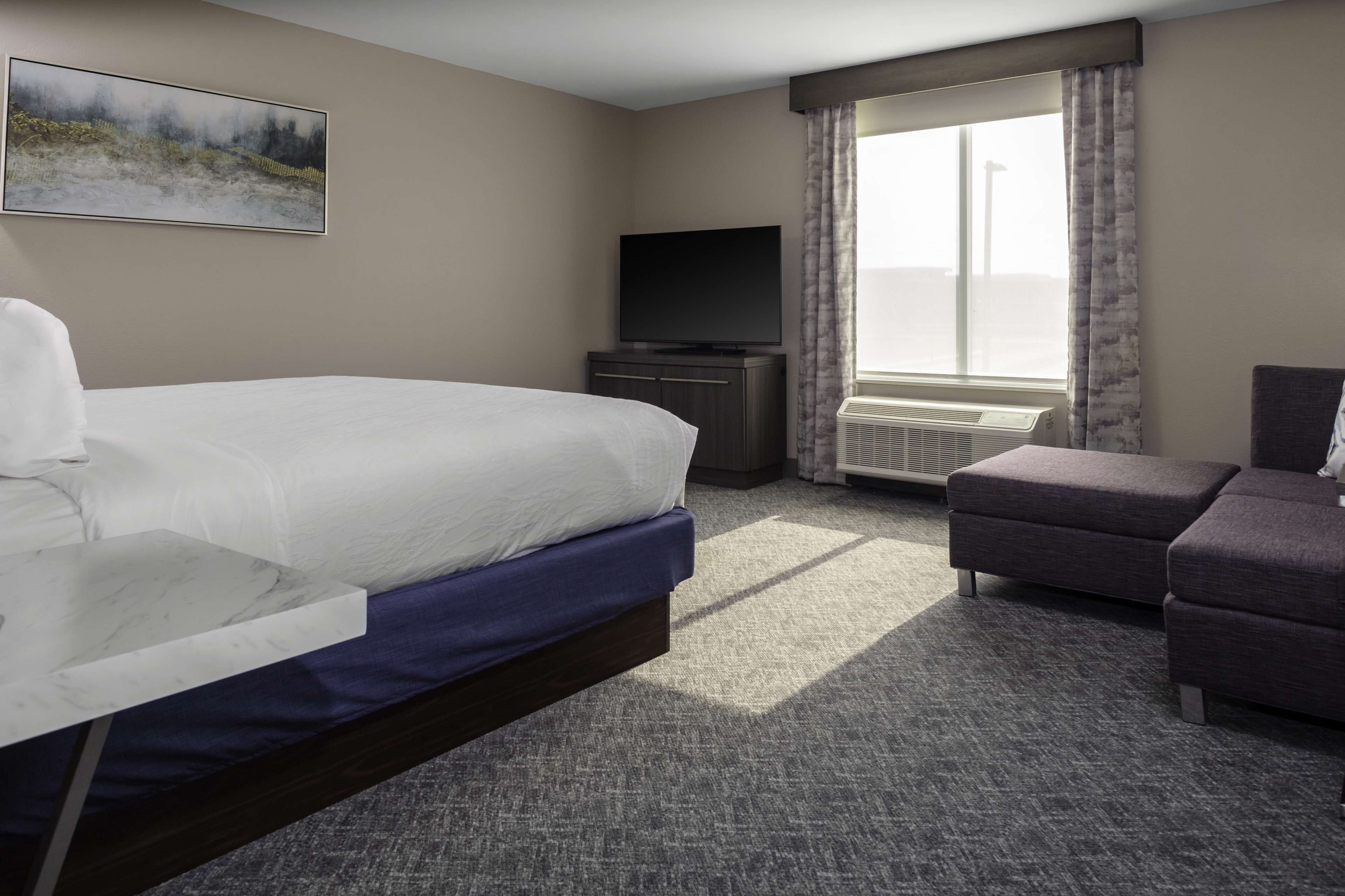 deluxe room, 1 king bed | desk, laptop workspace, blackout curtains, iron/ironing board