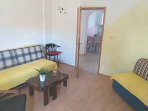 Apartment, 1 Bedroom | Living area | Flat-screen TV - Apartments Sienna (Medulin)