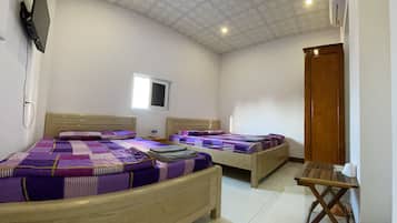 Family Quadruple Room | Minibar, iron/ironing board, free WiFi, bed sheets
