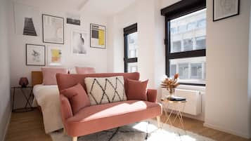 Studio Confort | Coin séjour | Télévision à écran plat de 80 cm avec chaßnes par satellite, télévision