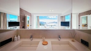 Bathtub, eco-friendly toiletries, hair dryer, bidet