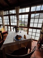 Breakfast, lunch, dinner served; local cuisine 