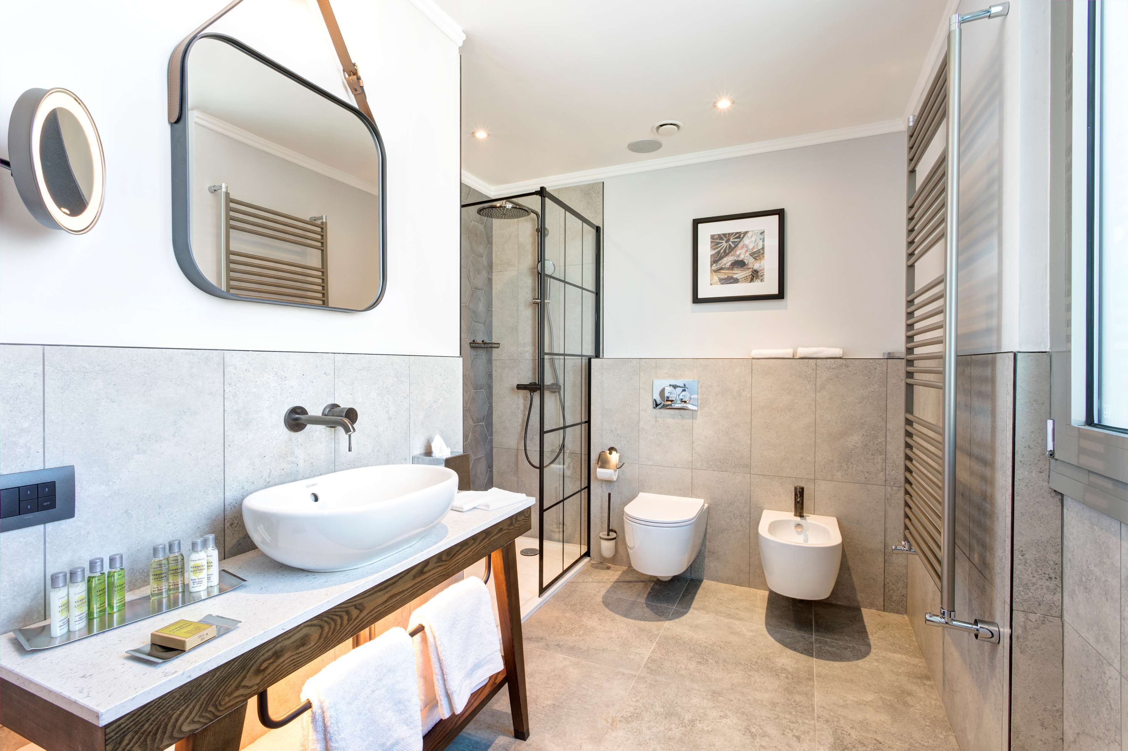 junior suite, 1 king bed, terrace | bathroom | hair dryer, slippers, bidet, towels