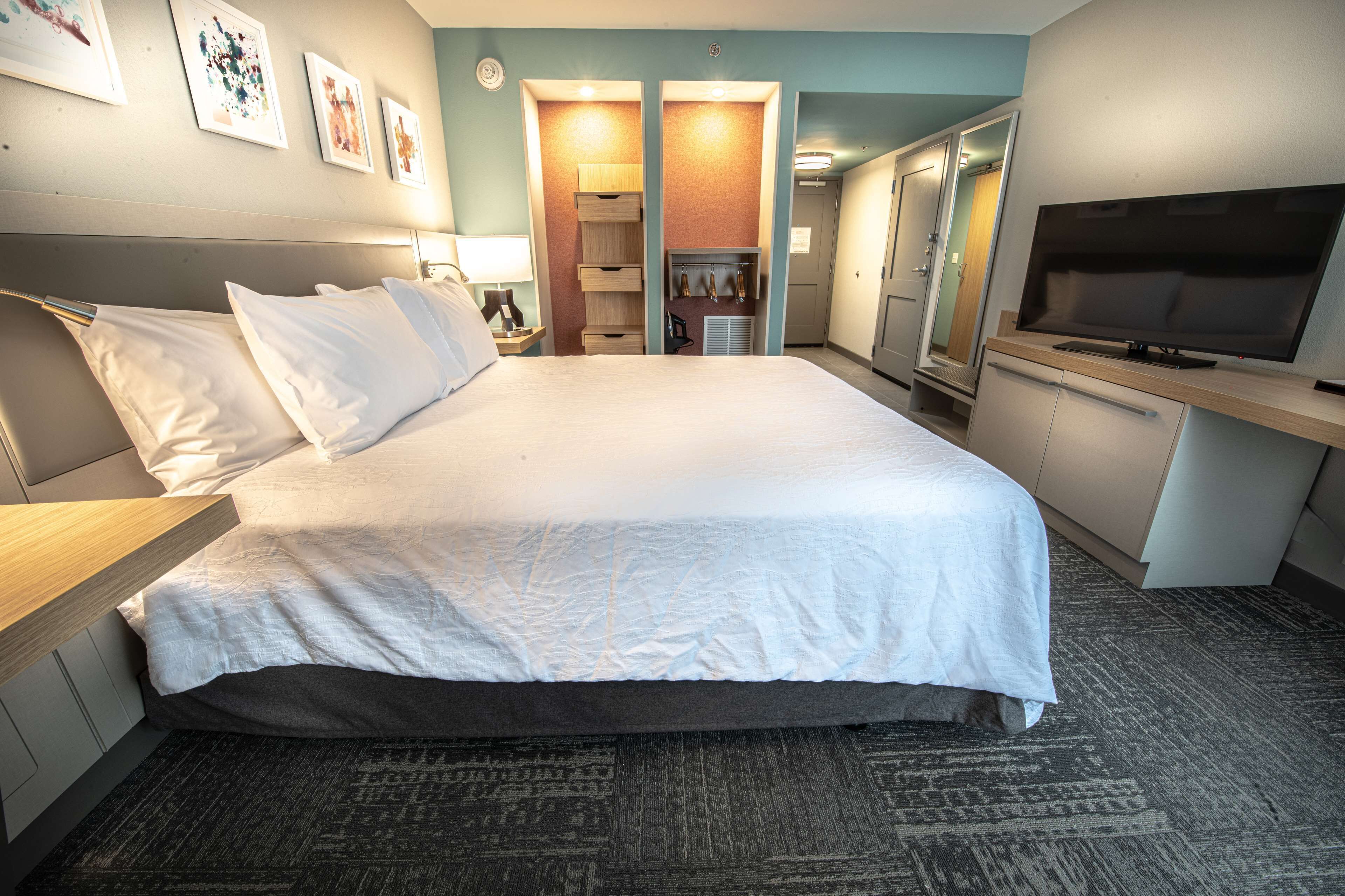 desk, laptop workspace, blackout curtains, iron/ironing board