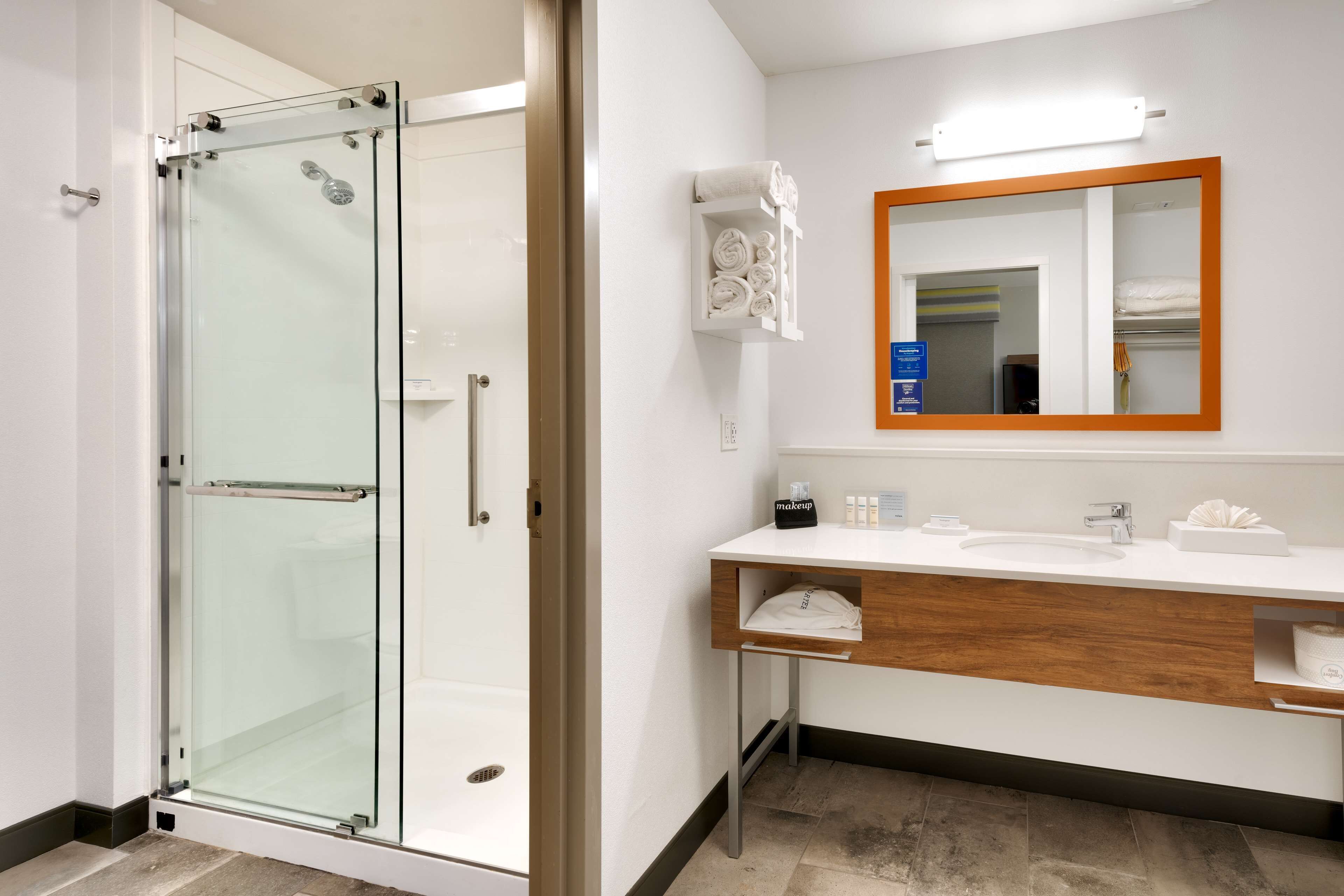 studio, 1 king bed, refrigerator & microwave (wet bar) | bathroom shower