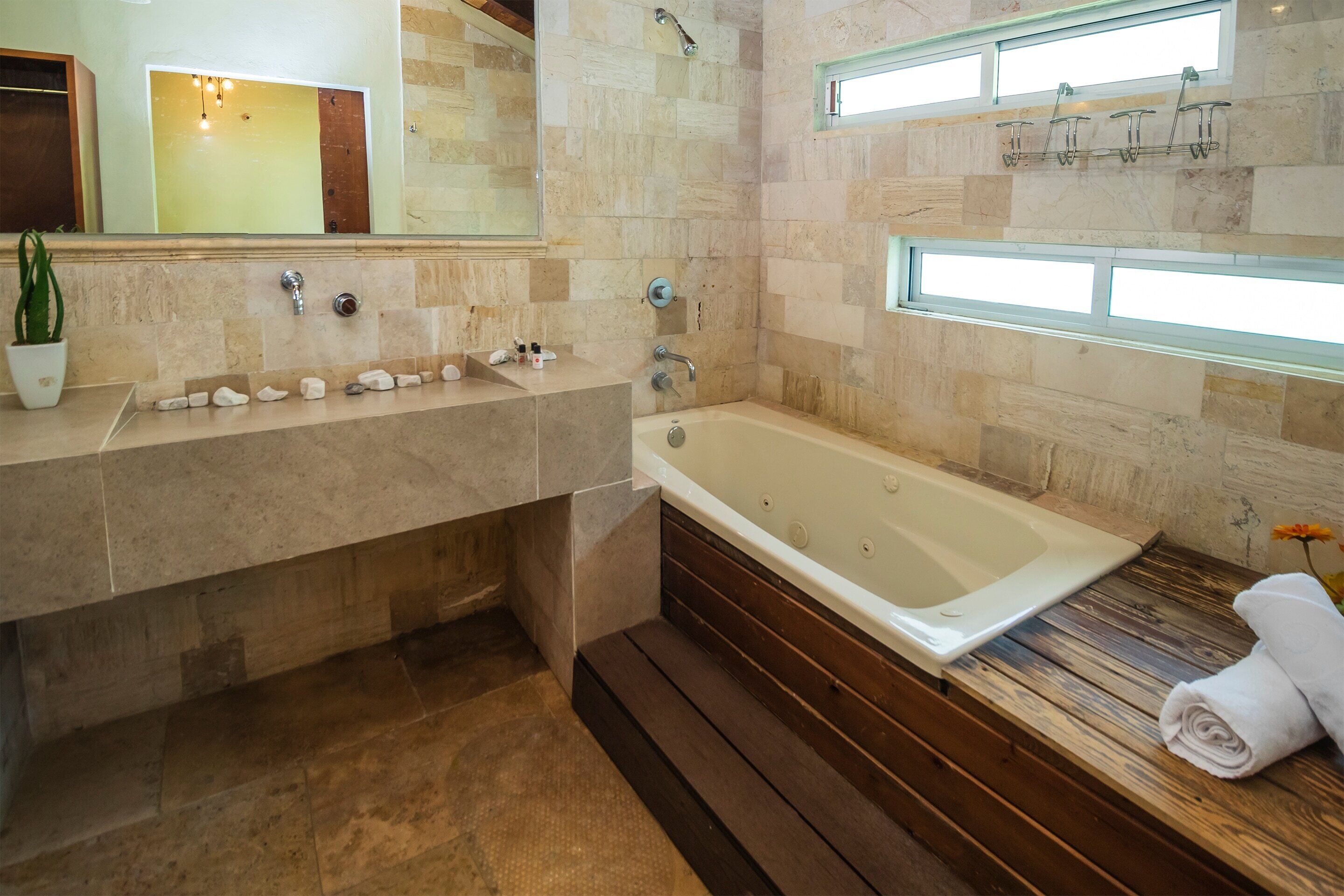 junior suite | bathroom | shower, towels, soap, shampoo