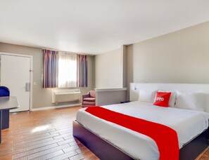 Chambre, 1 très grand lit | Bureau, accès au Wi-Fi (inclus), literie fournie