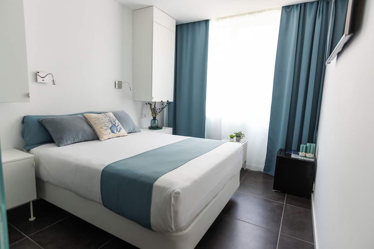 Standard Double Room | 1 bedroom, minibar, in-room safe, individually decorated