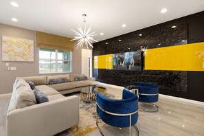 House, Multiple Beds (ST014V: 10 Bed, Moana, Star Wars) | Living room | Flat-screen TV, fireplace, video games, foosball - St014v: 10 Bed, Moana, Star Wars (Davenport)