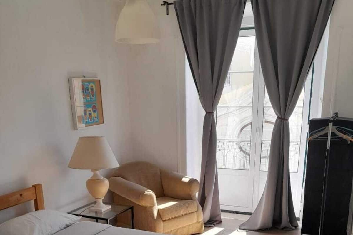 Economy Triple Room, 1 Double Bed, Balcony | Iron/ironing board, free WiFi