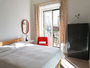 Triple Room, 1 Double Bed | Iron/ironing board, free WiFi - Open World Hostel (Lisbon)